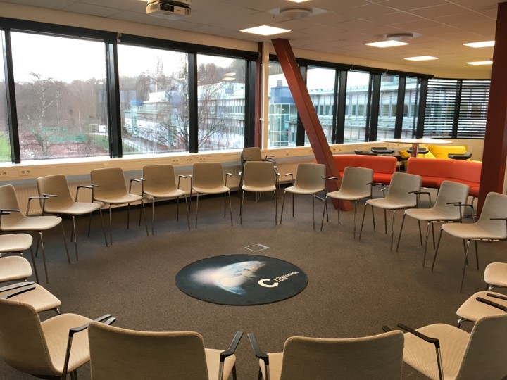 Empty circle of chairs at the Challenge Lab