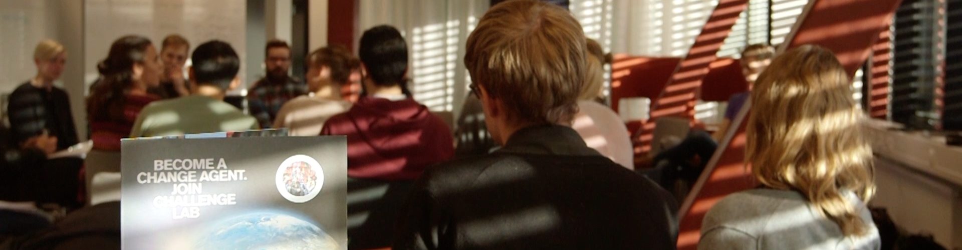 People sitting in a circle having a dialogue